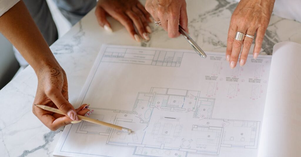 Women collaborating on architectural plans, emphasizing teamwork and precision.