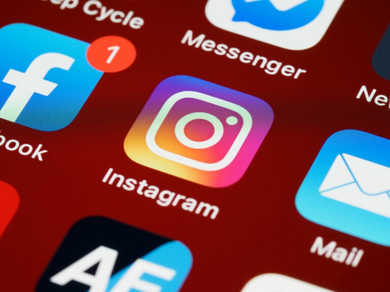 Vibrant close-up of popular social media app icons on a smartphone screen.